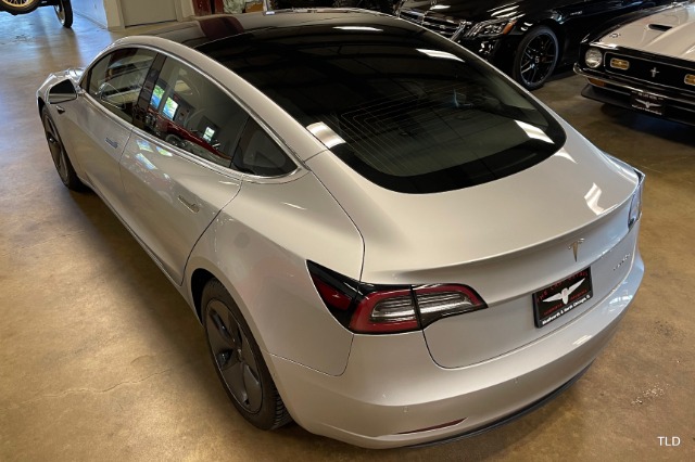 A silver 2018 Tesla model 3